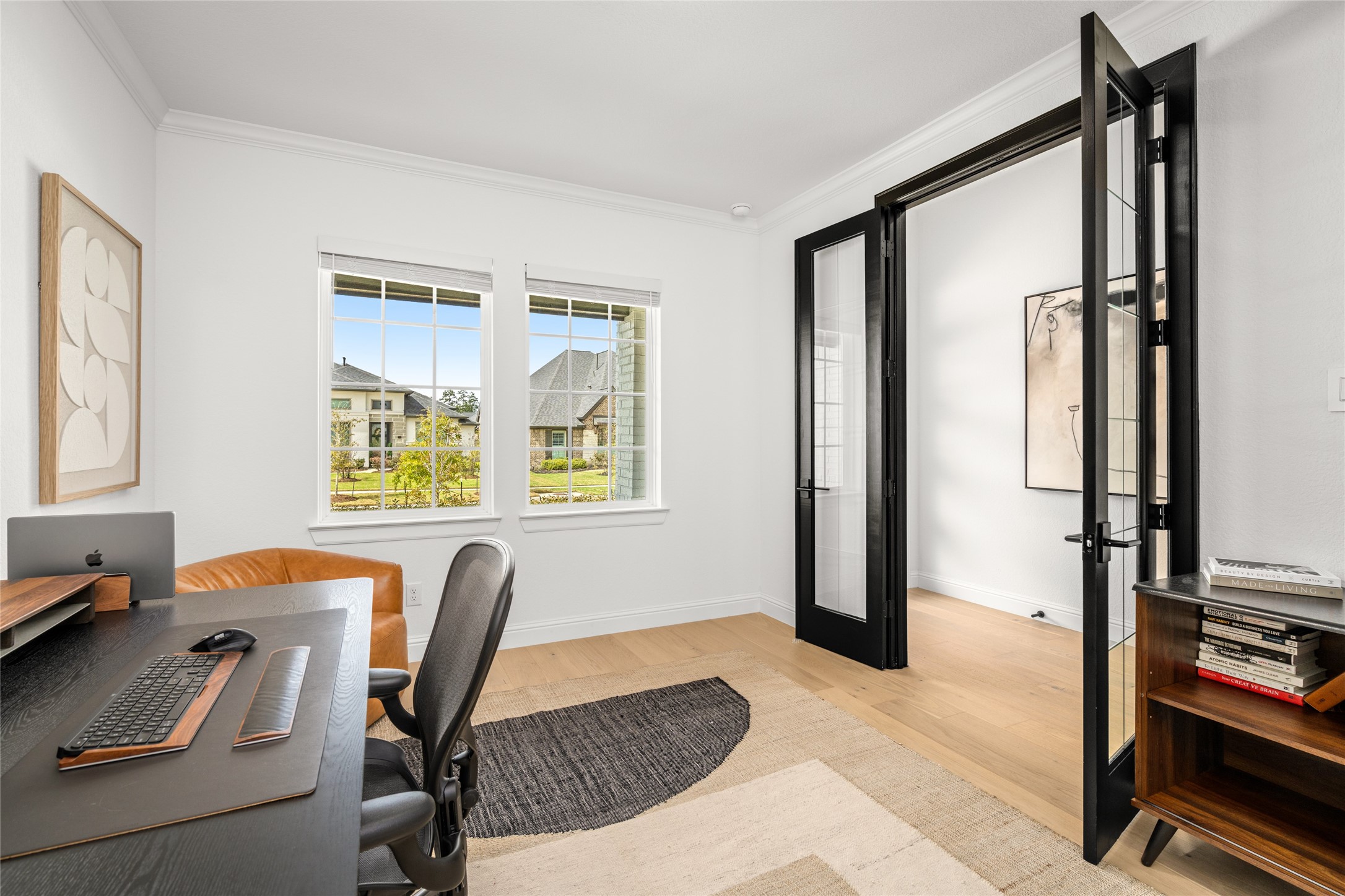 17461 Bayflower Conroe, TX 77385 - Photo 17 of 49 Secondary view of the office with French doors, abundant natural light, and views of the front yard.