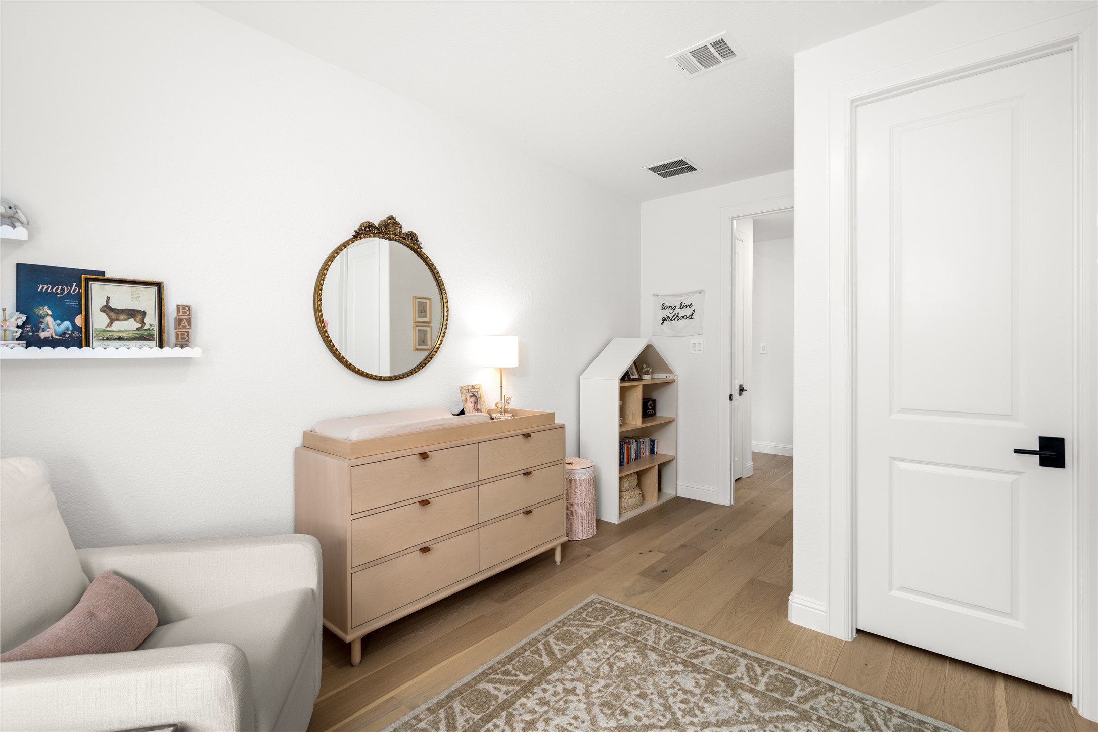 17461 Bayflower Conroe, TX 77385 - Photo 26 of 49 Another view of the inviting 2nd bedroom with soft neutral finishes, and a versatile layout ideal for a nursery or guest room.