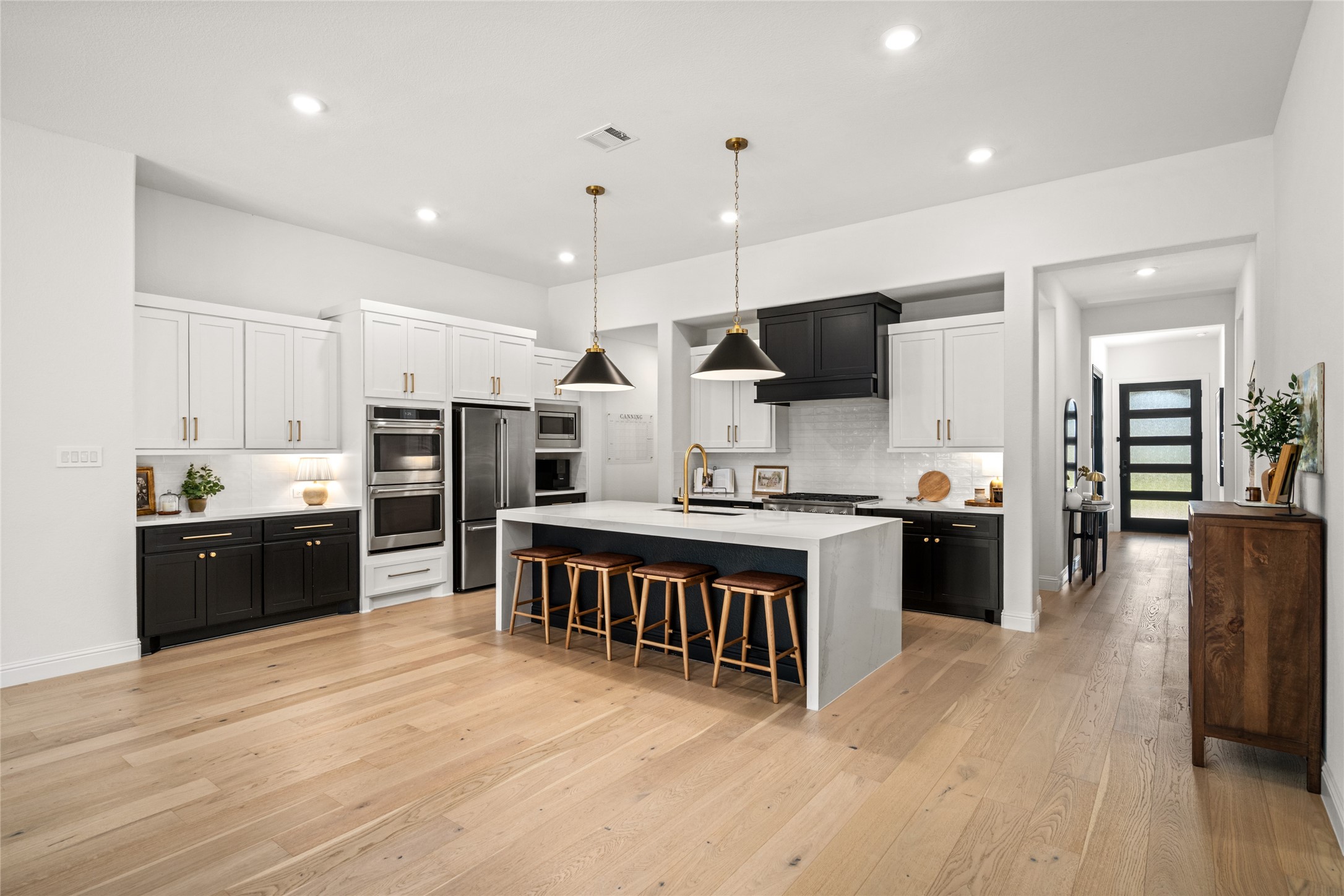 17461 Bayflower Conroe, TX 77385 - Photo 49 of 49 The floor plan features an open-concept design for entertaining and stunning upgraded engineered wood flooring totaling almost $49,000.