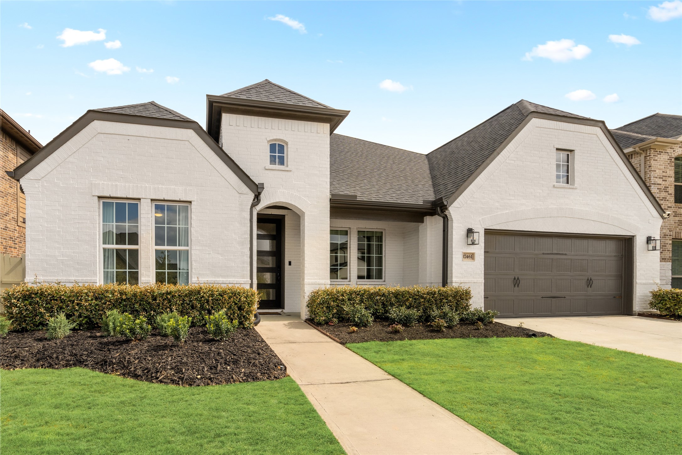 17461 Bayflower Conroe, TX 77385 - Photo 41 of 49 Modern architectural details enhanced by beautifully maintained, lush landscaping.