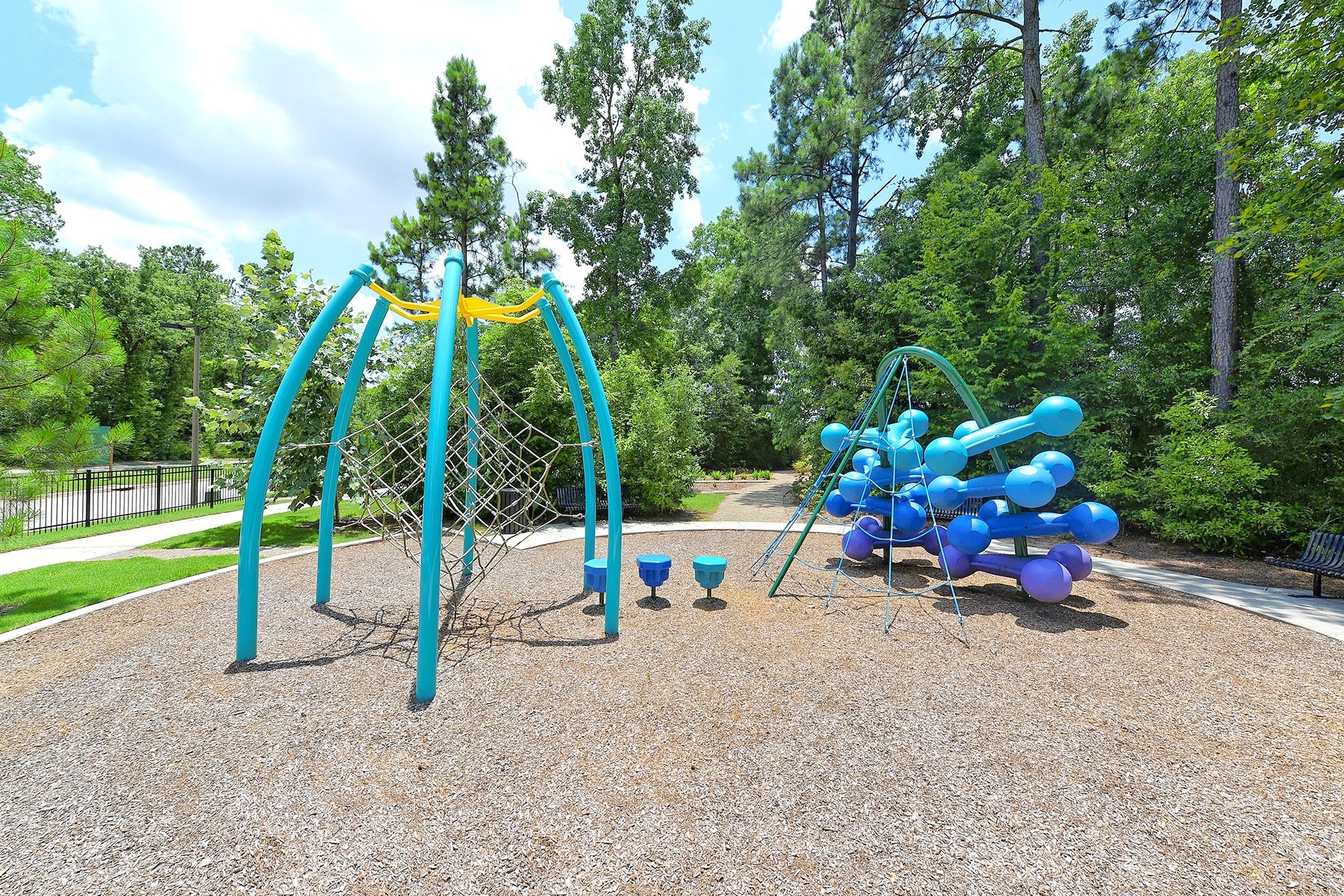 17461 Bayflower Conroe, TX 77385 - Photo 48 of 49 One of the community playgrounds nestled among mature trees.
