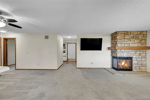 a view of a livingroom with a fireplace