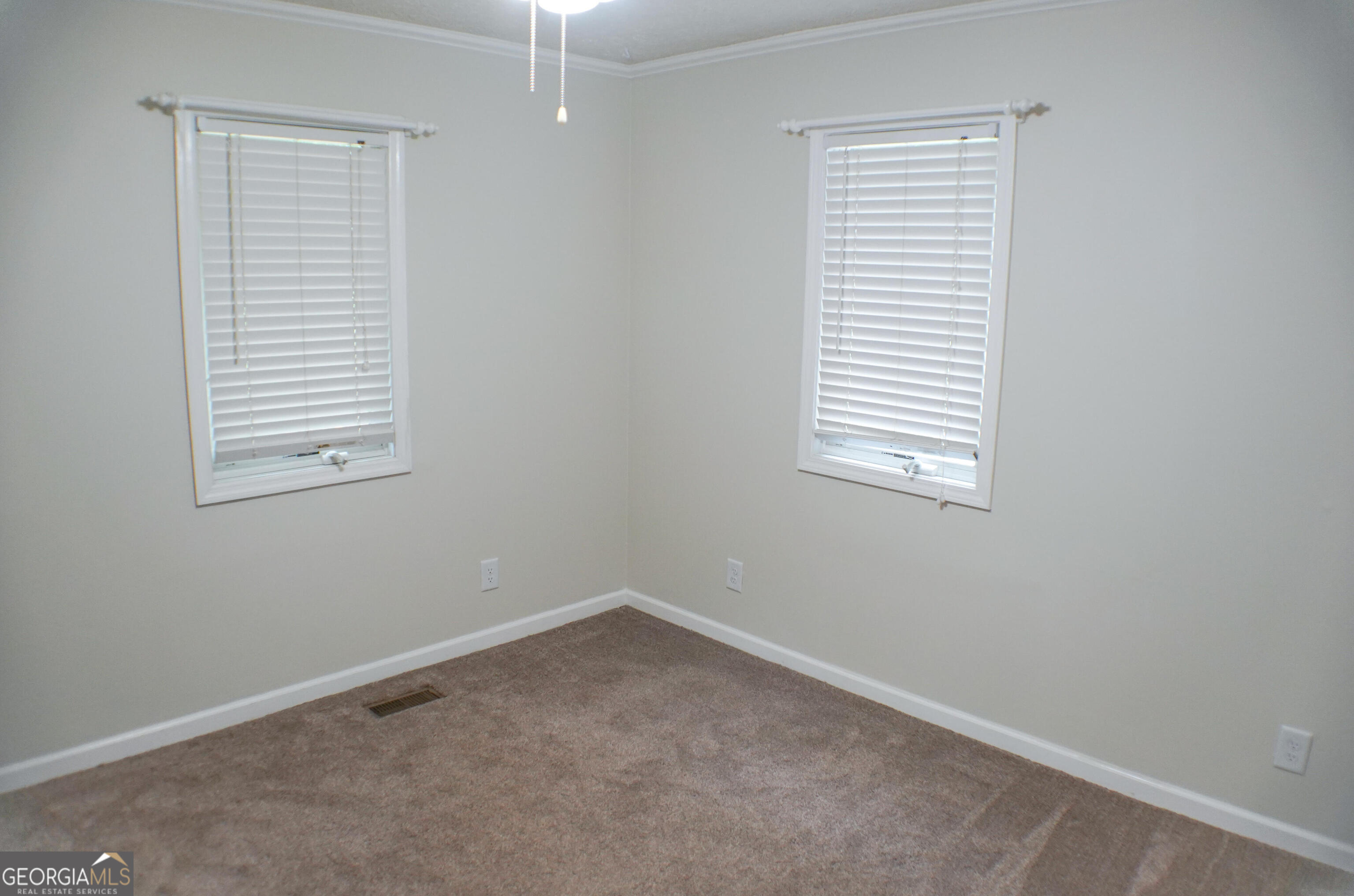 335 Winding Stream Trail Hampton, GA 30228 - Photo 12 of 35 an empty room with a window