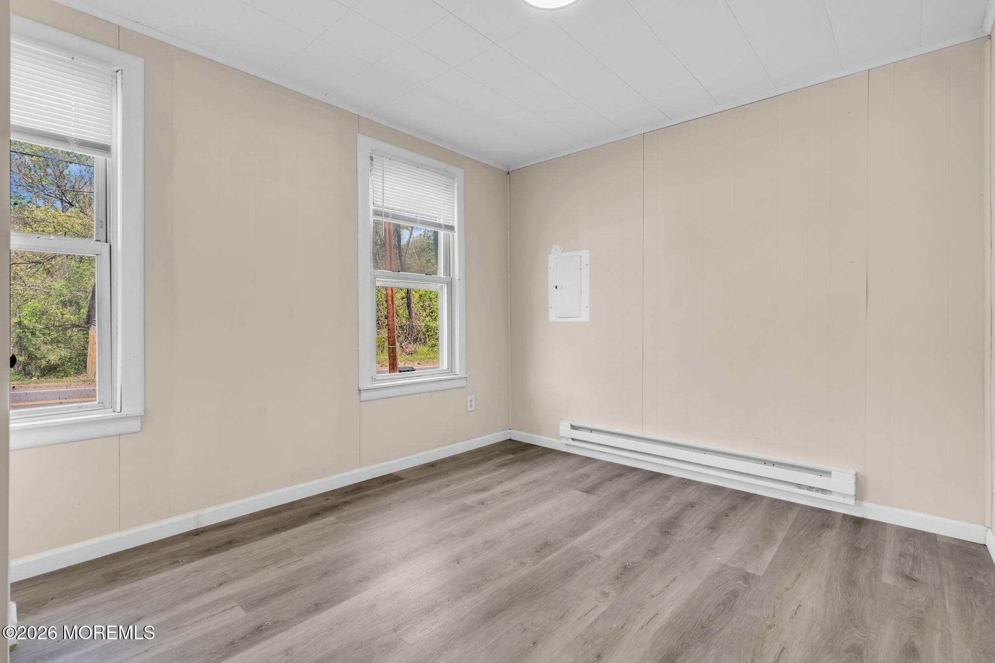 9 Arneytown-Hornerstown Road Cream Ridge, NJ 08514 - Photo 28 of 58 an empty room with wooden floor and windows