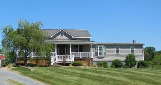 223 Natural Chimney Road Mount Solon, VA 22843 - Photo 1 of 18 front view of a house with a yard