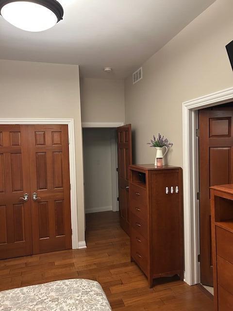 9261 Ruth Court St. John, IN 46373 - Photo 24 of 48 a view of a hallway with wooden floor and cabinet