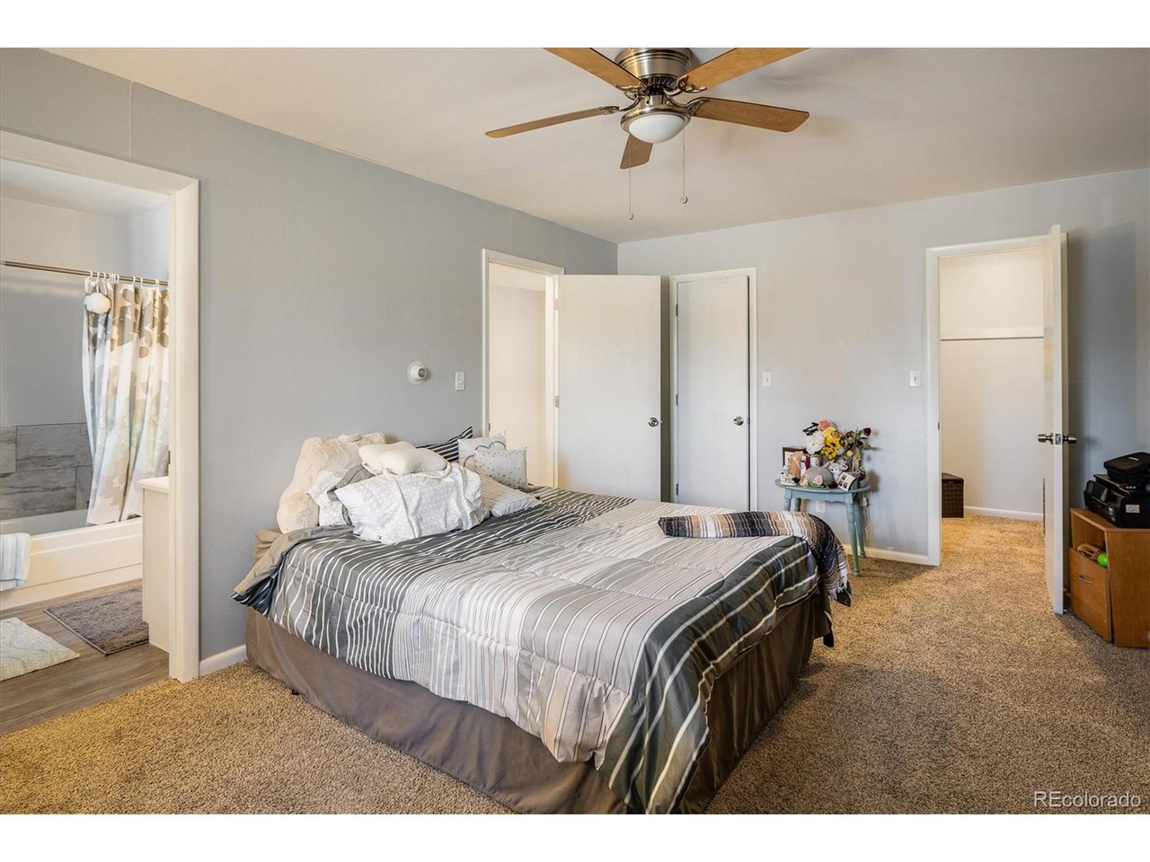 3830 Otis Street, Unit 4 Wheat Ridge, CO 80033 - Photo 12 of 26 Primary Bedroom with 2 Walk-In Closets.