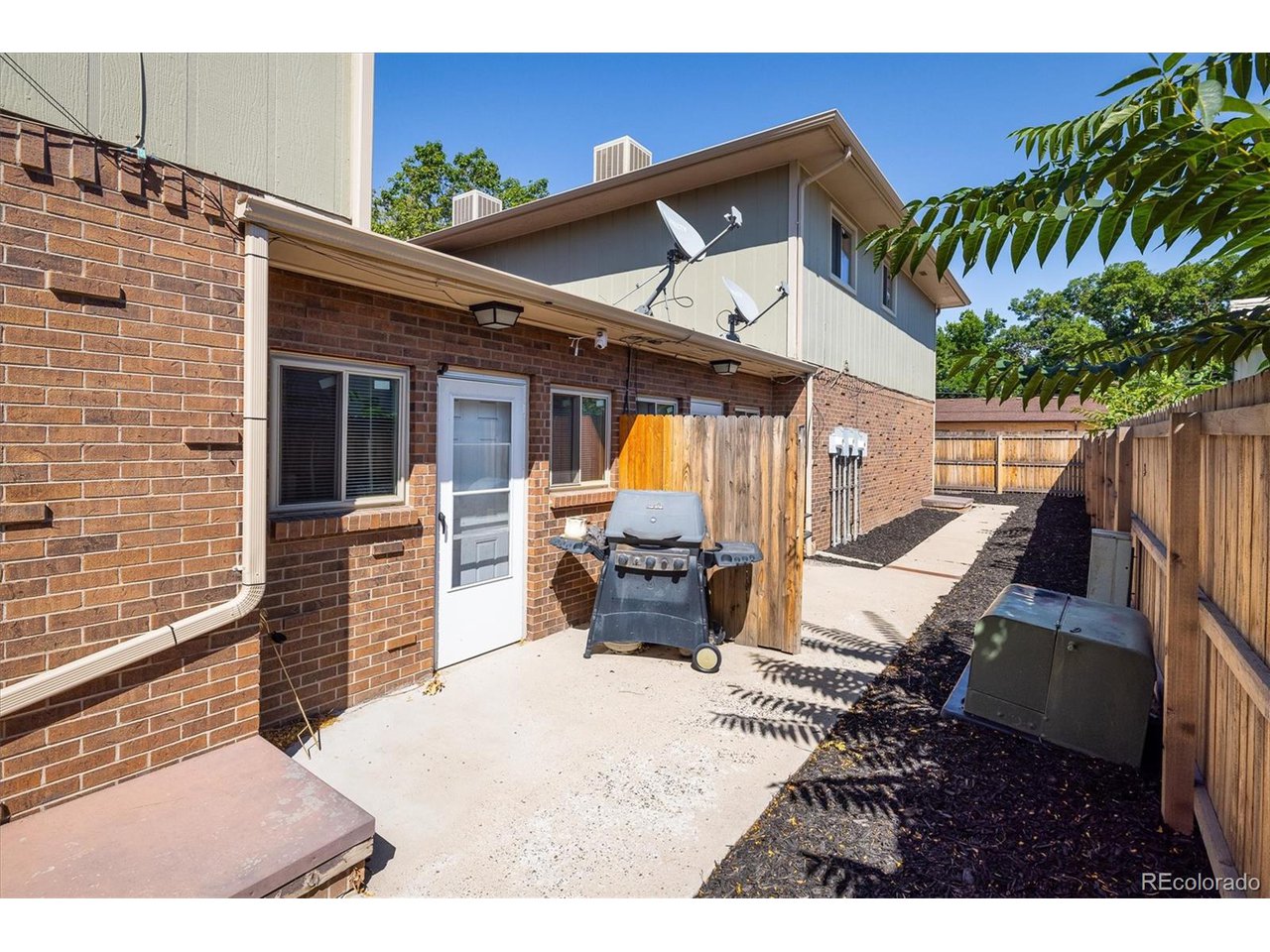 3830 Otis Street, Unit 4 Wheat Ridge, CO 80033 - Photo 19 of 26 Each unit has a side patio.