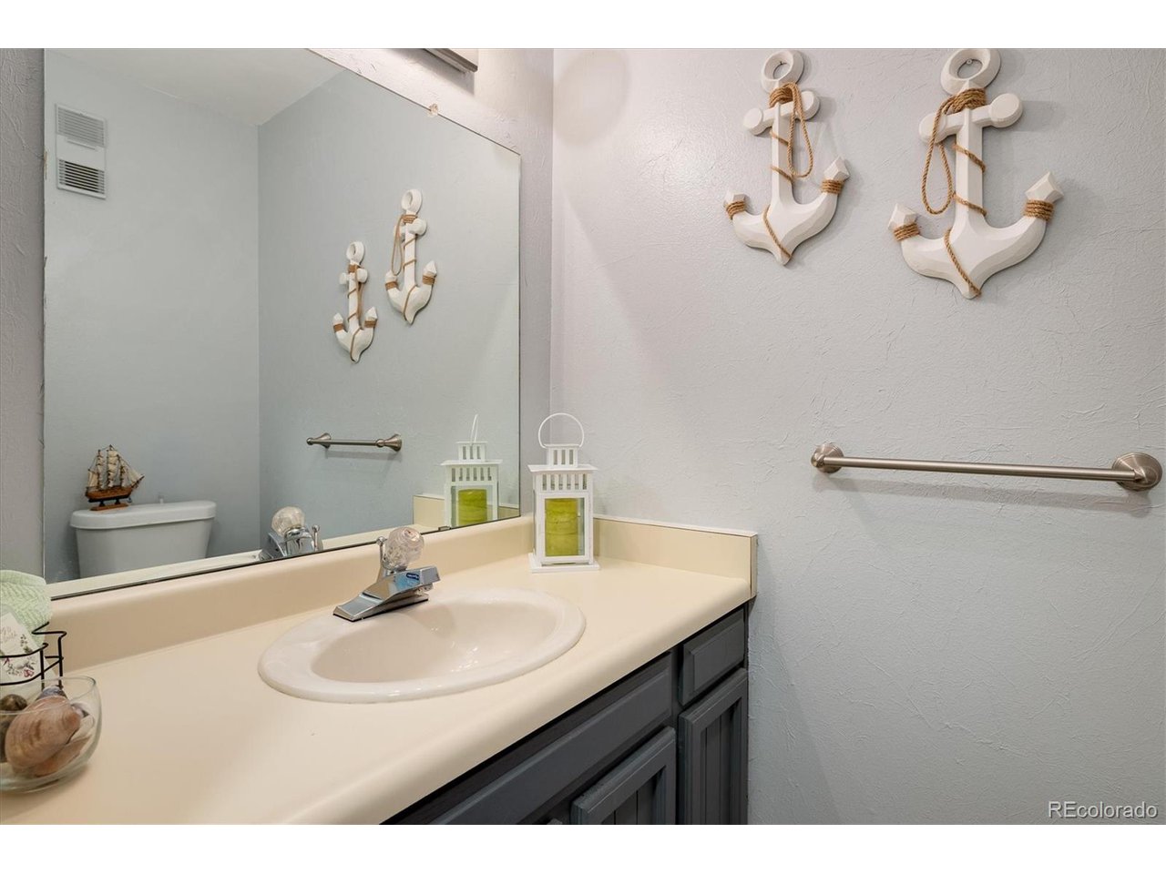 3830 Otis Street, Unit 4 Wheat Ridge, CO 80033 - Photo 10 of 26 Main floor bathroom.