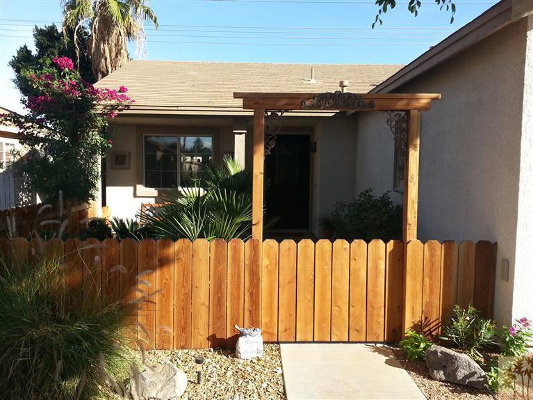 47800 Madison Street, Unit 99 Indio, CA 92201 - Photo 11 of 13 a front view of house with a garden