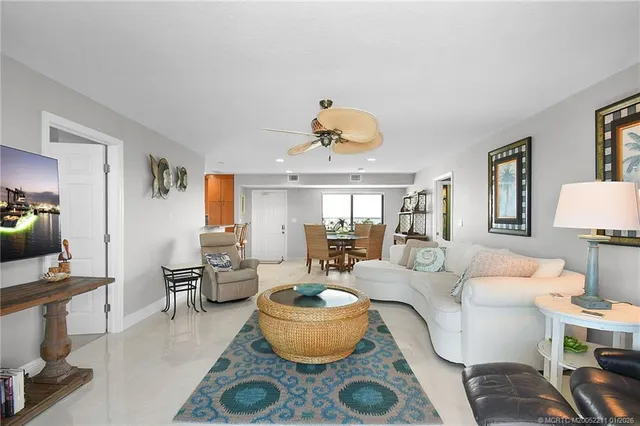 a view of building with swimming pool and sitting space