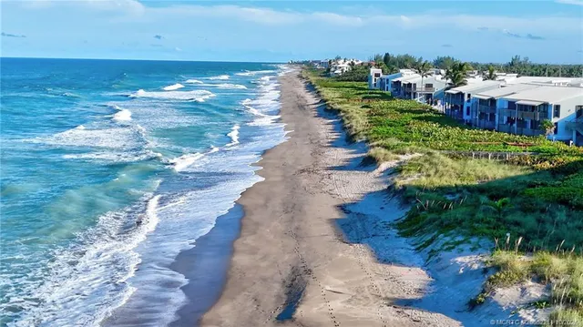 a view of an ocean with city