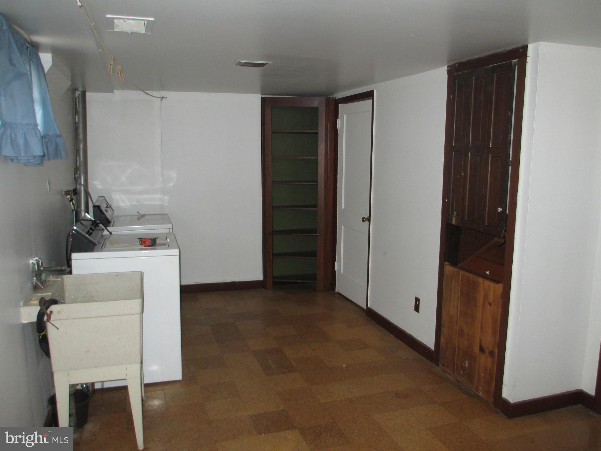 7426 Remoor Road Baltimore, MD 21207 - Photo 20 of 28 a utility room with dryer and washer