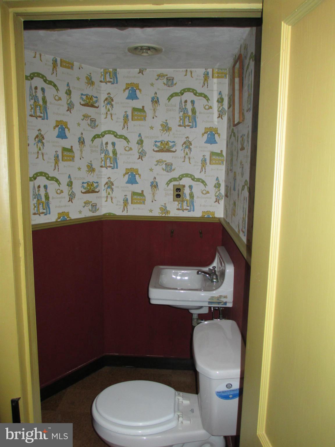7426 Remoor Road Baltimore, MD 21207 - Photo 23 of 28 a bathroom with a toilet and a sink
