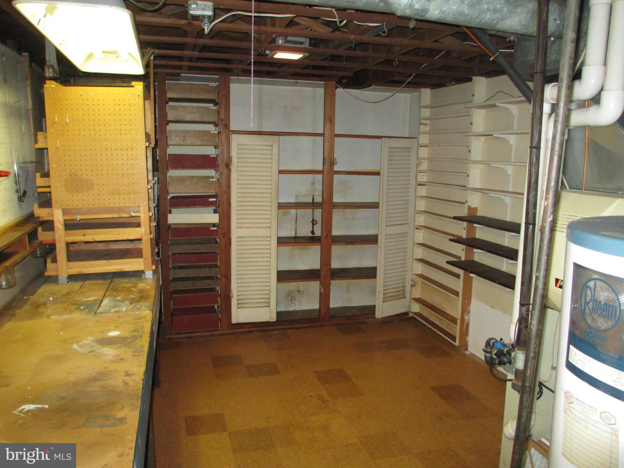 7426 Remoor Road Baltimore, MD 21207 - Photo 24 of 28 a view of walk in closet with clothes