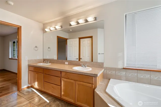 a view of a small space with wooden floor