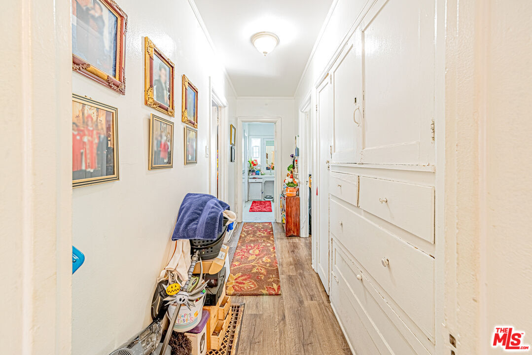 1618 South Burnside Avenue Los Angeles, CA 90019 - Photo 15 of 43 a view of entryway and hall with wooden floor