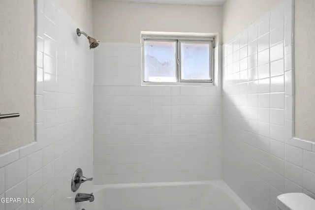 a bathroom with a bathtub