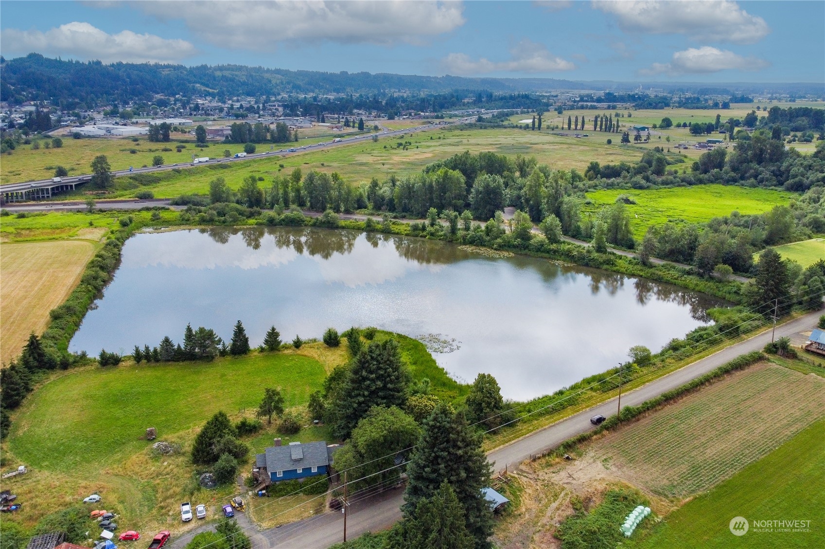 0 Southwest Hillburger Road Chehalis, WA 98532 - Photo 13 of 16 a view of a lake with a city