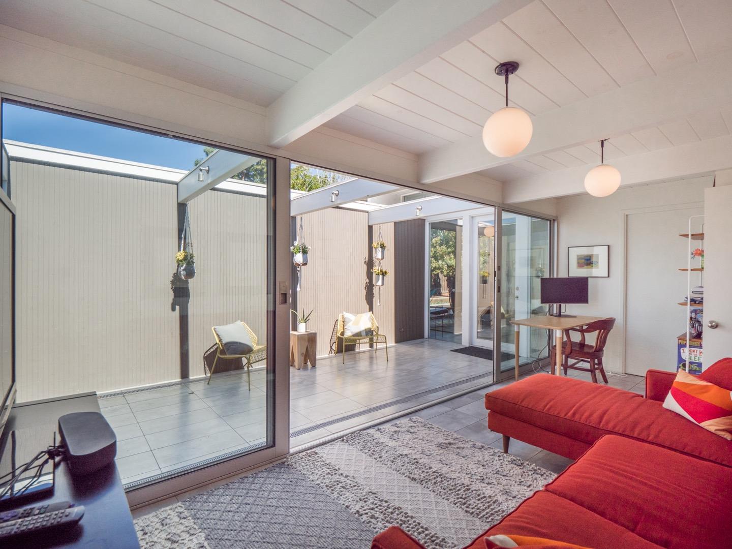 3449 Thomas Drive Palo Alto, CA 94303 - Photo 30 of 59 a living room with furniture and wooden floor
