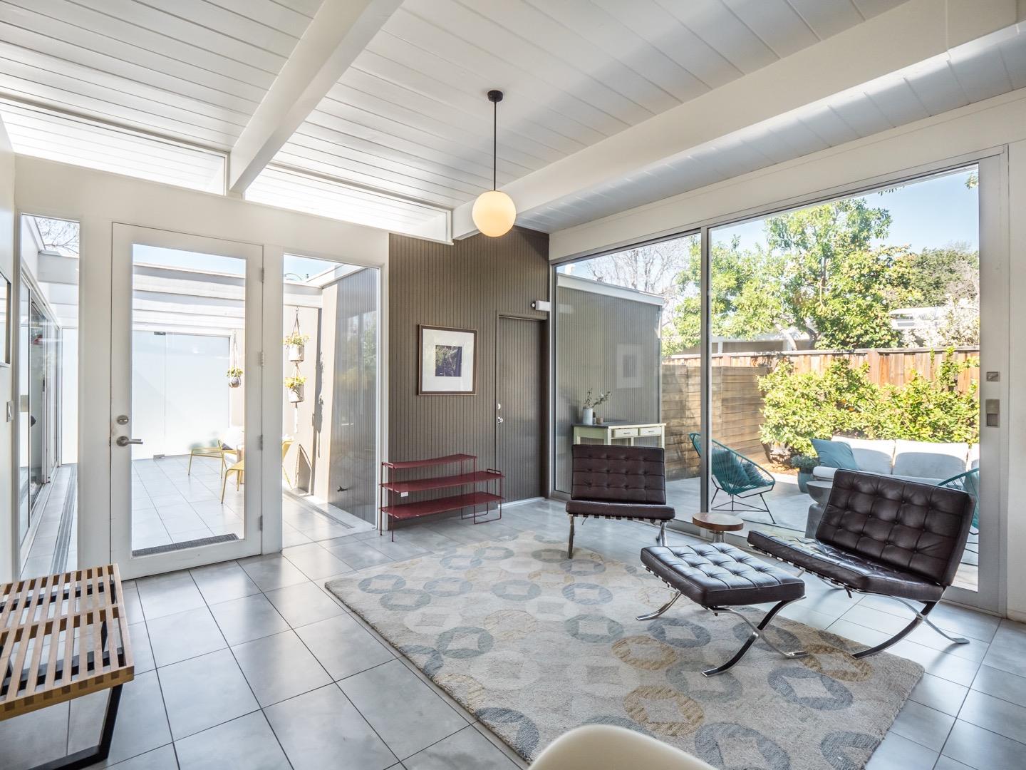 3449 Thomas Drive Palo Alto, CA 94303 - Photo 3 of 59 a living room with furniture and a window