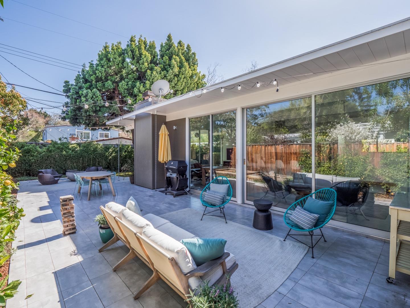 3449 Thomas Drive Palo Alto, CA 94303 - Photo 40 of 59 a outdoor living space with furniture potted plant and a large window