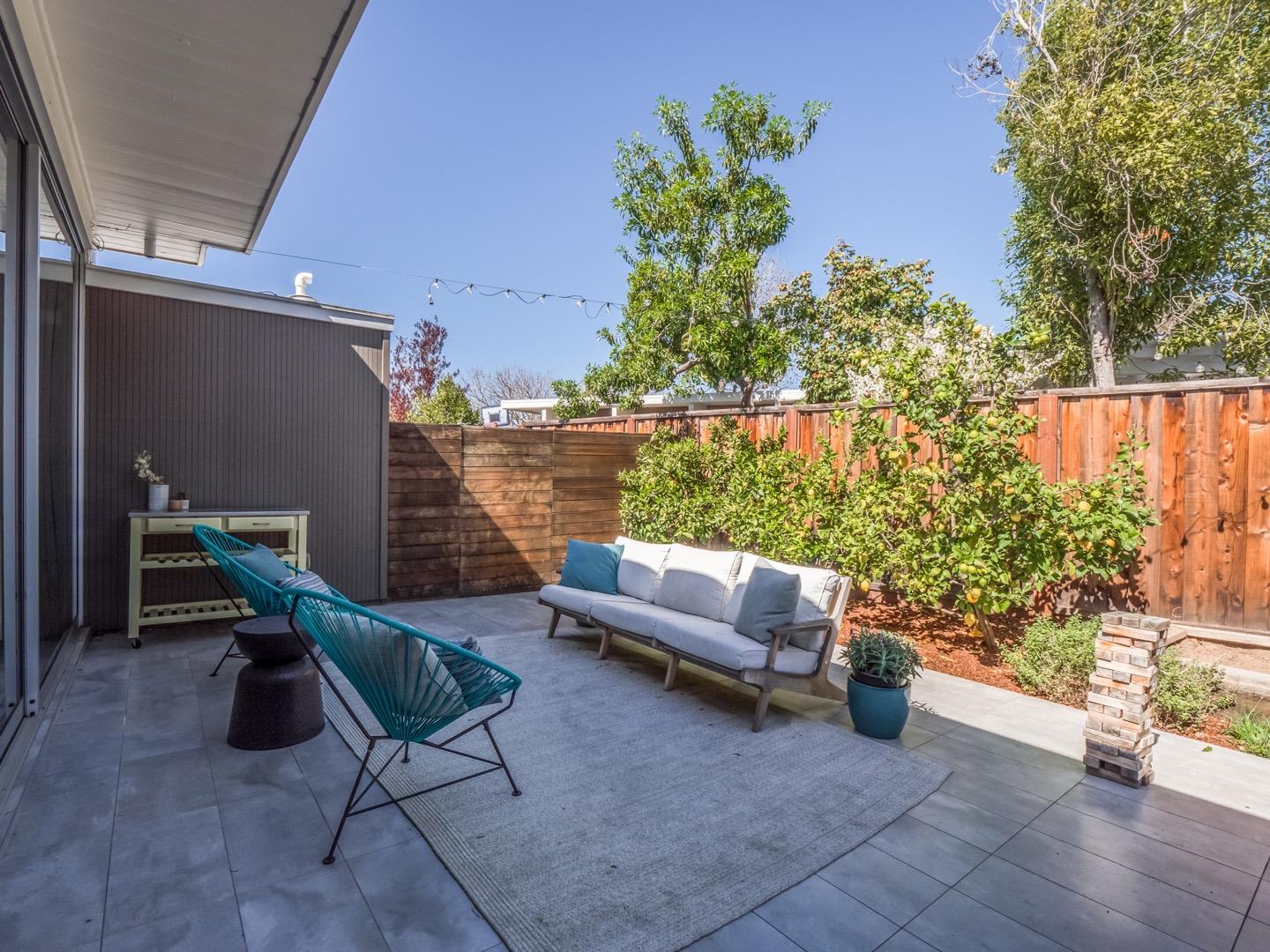 3449 Thomas Drive Palo Alto, CA 94303 - Photo 42 of 59 a balcony with furniture and a potted plant