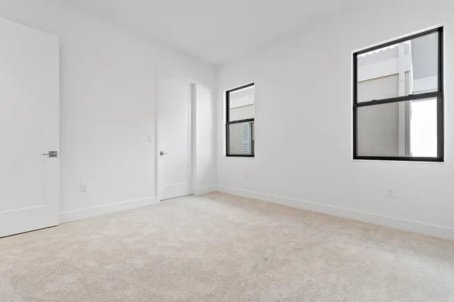 a view of a hallway with closet