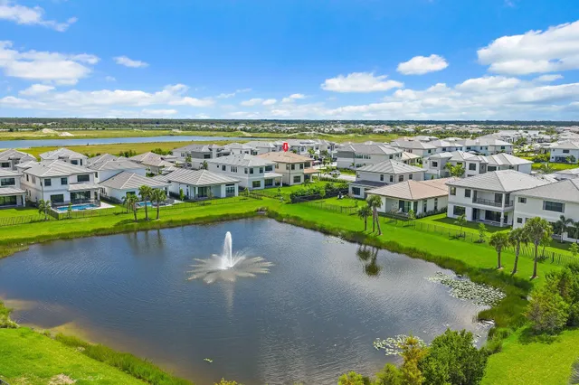 a view of a lake with a building in the background