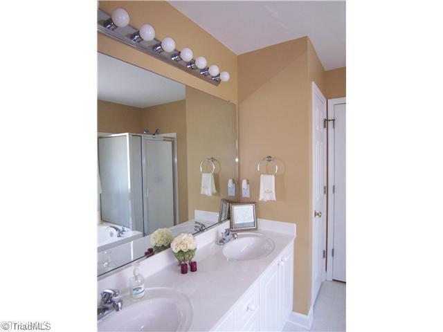 7523 Kristen Drive Oak Ridge, NC 27310 - Photo 11 of 15 Master Bath/Spa. Double sinks, garden tub & separate shower....