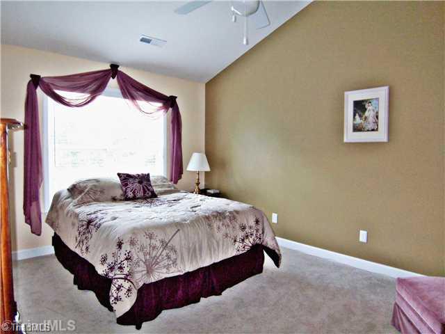 7523 Kristen Drive Oak Ridge, NC 27310 - Photo 10 of 15 Master Bedroom.
