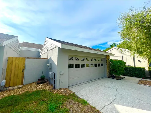 a large building with a large tree in front of it
