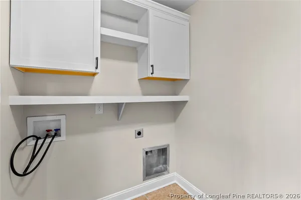 a bathroom with a sink and a window