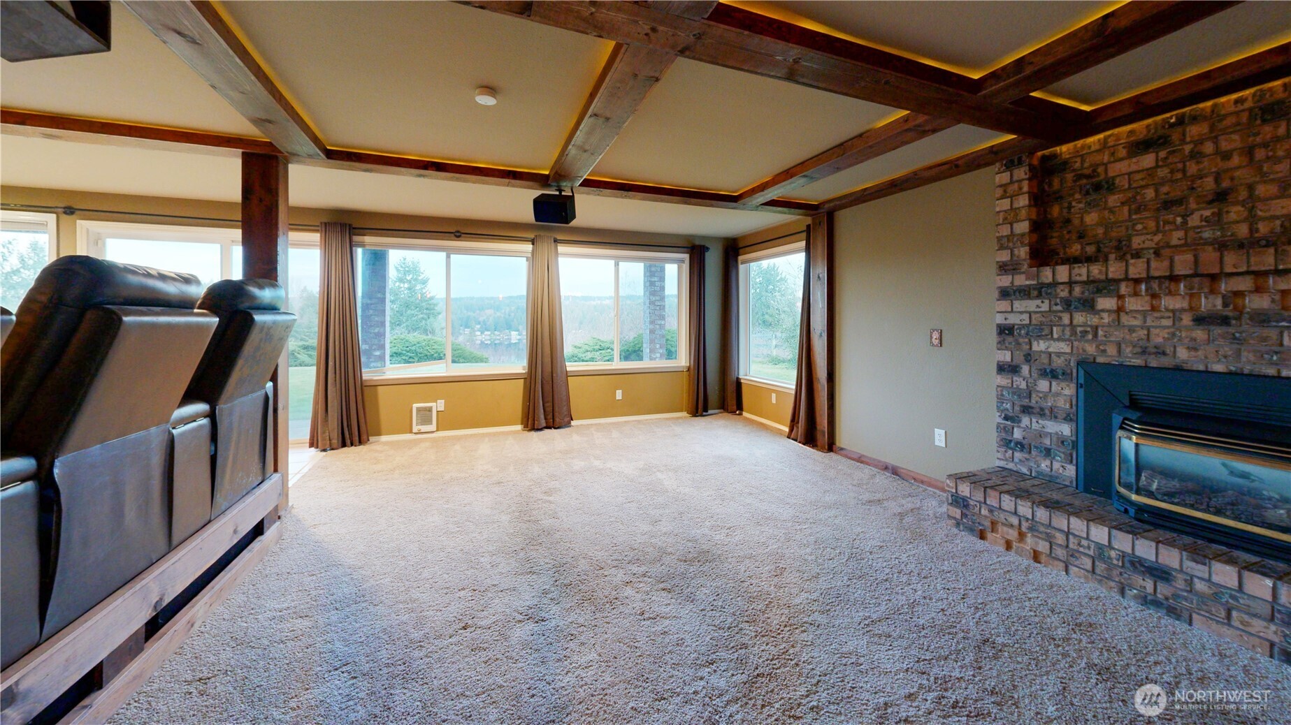 5810 Meridian Road Southeast Olympia, WA 98513 - Photo 31 of 40 a view of an empty room with a fireplace and a window