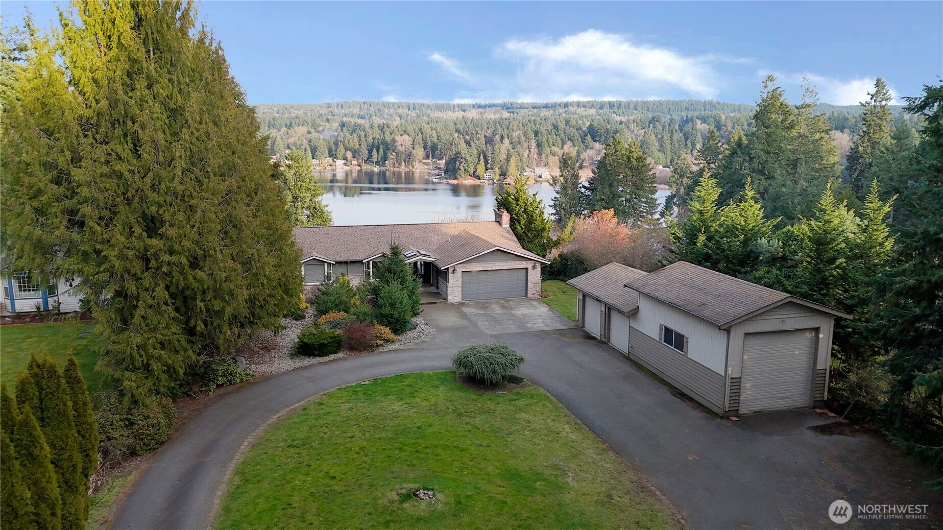 5810 Meridian Road Southeast Olympia, WA 98513 - Photo 38 of 40 an aerial view of a house with a garden and lake view