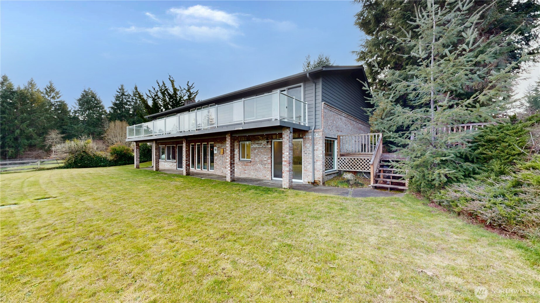 5810 Meridian Road Southeast Olympia, WA 98513 - Photo 6 of 40 a backyard of a house with yard and trampoline