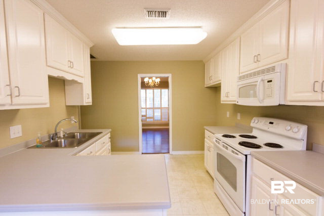 809 Henckley Avenue Mobile, AL 36609 - Photo 14 of 39 Leads Straight into Dining Room