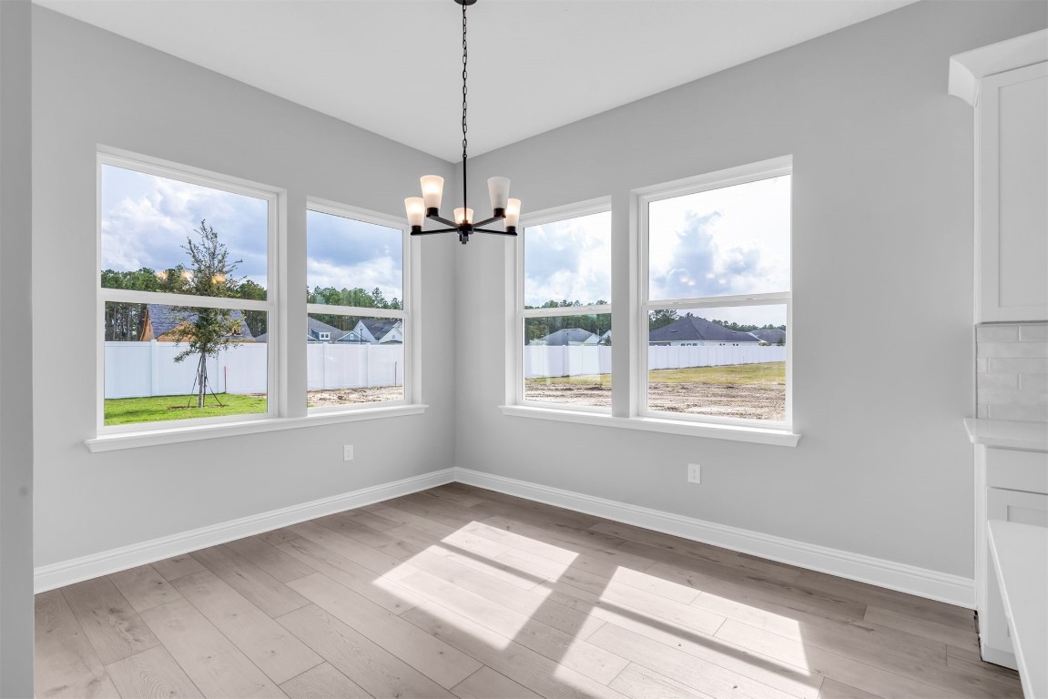 454 Slash Pine Place Yulee, FL 32097 - Photo 13 of 34 a view of an empty room with a window
