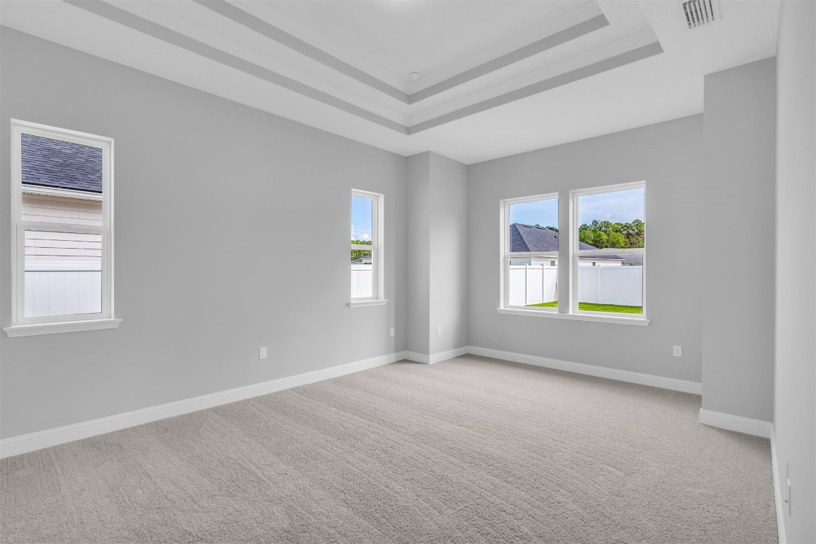 454 Slash Pine Place Yulee, FL 32097 - Photo 17 of 34 an empty room with windows