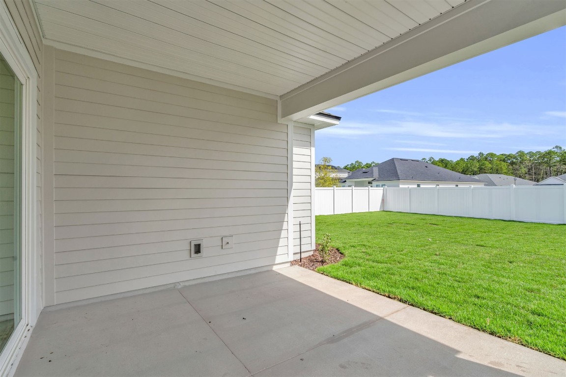 454 Slash Pine Place Yulee, FL 32097 - Photo 22 of 34 a view of a backyard