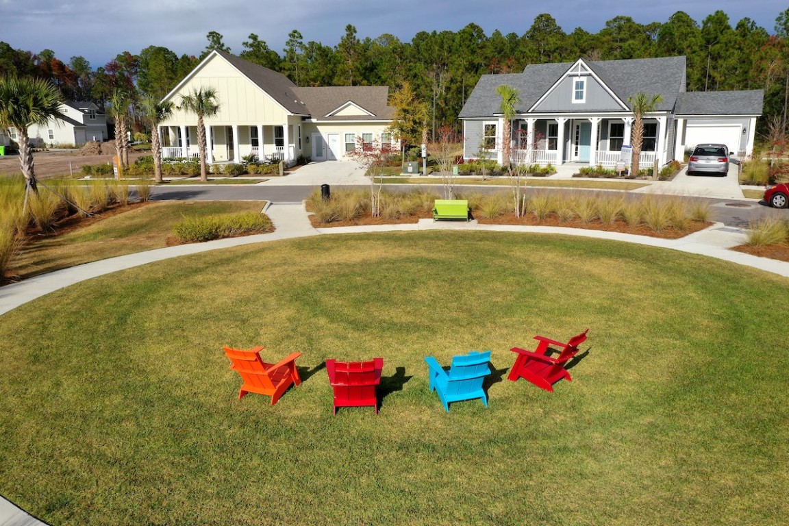 454 Slash Pine Place Yulee, FL 32097 - Photo 28 of 34 a front view of a house with swimming pool