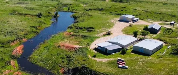 an aerial view of residential house with outdoor space