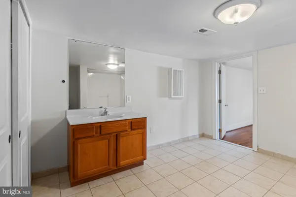 a view of a sink and a mirror