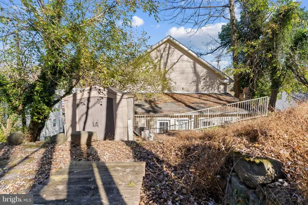 a view of a house with a tree