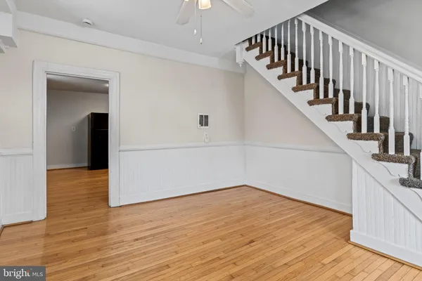 a view of entryway with wooden floor