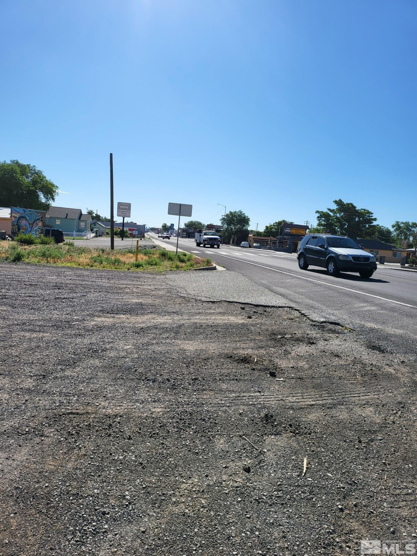 420 West Main Street Fernley, NV 89408 - Photo 5 of 5 a view of a lake with beach and car parked
