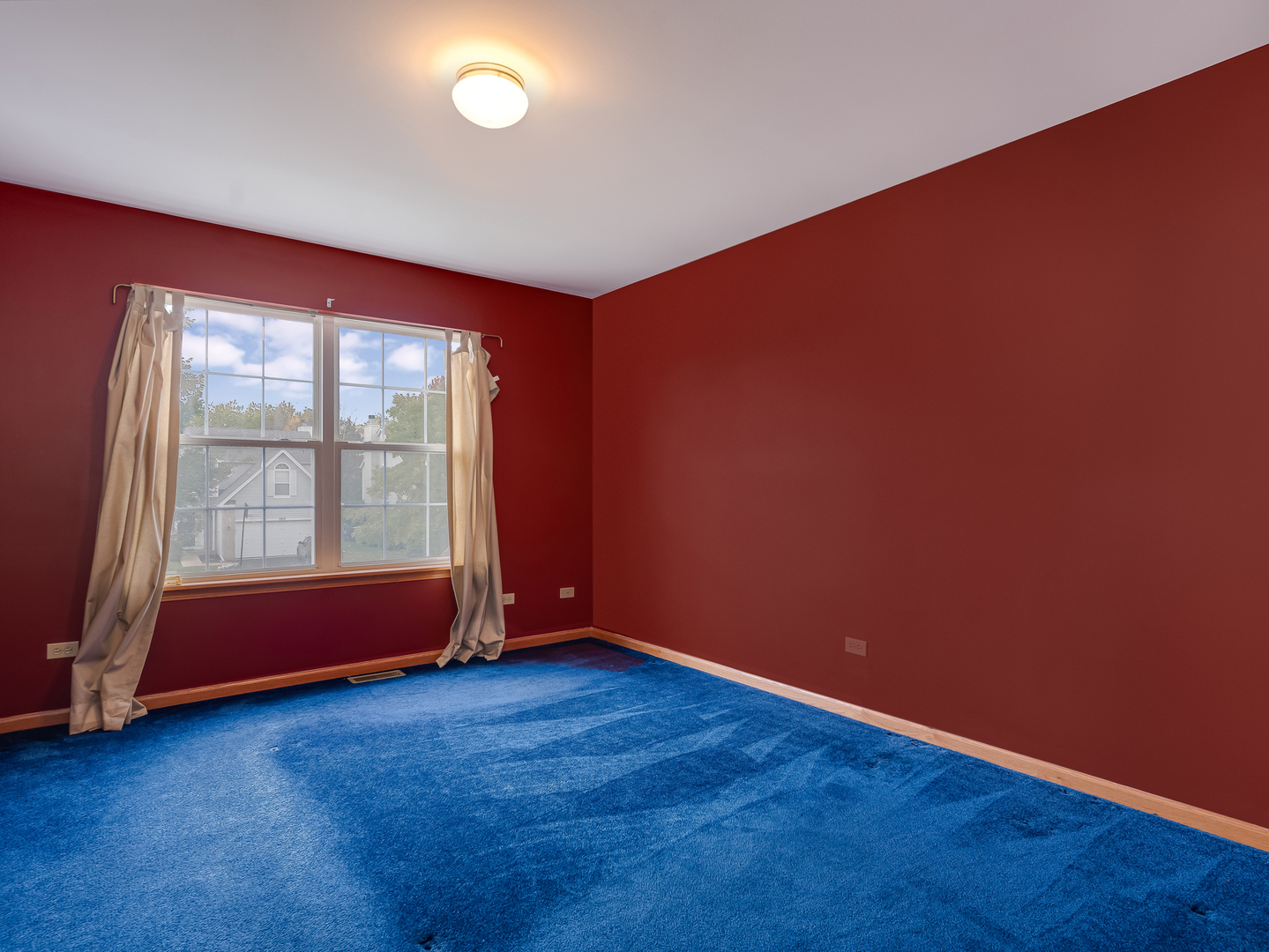 1910 Arbor Fields Drive Plainfield, IL 60586 - Photo 23 of 26 an empty room with wooden floor and windows