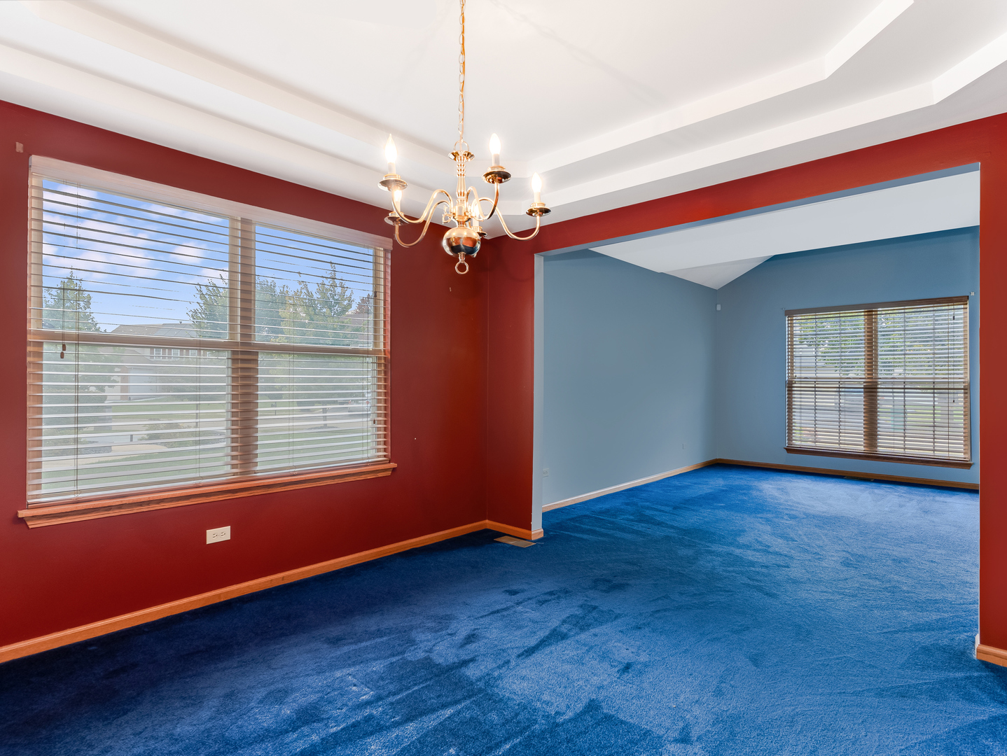 1910 Arbor Fields Drive Plainfield, IL 60586 - Photo 6 of 26 a view of an empty room with wooden floor and a window