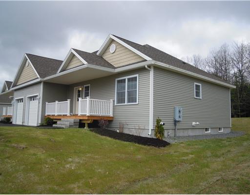 44 Highland Ridge Drive, Unit 9 Hampden, ME 04444 - Photo 1 of 25 Exterior Front. Unit 9 at Highland...