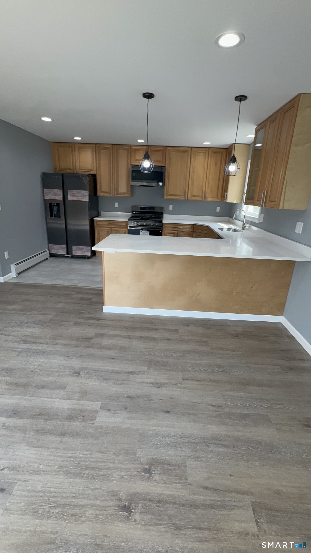 74 Prospect Hill Road New Milford, CT 06776 - Photo 15 of 16 a view of kitchen with microwave and cabinets